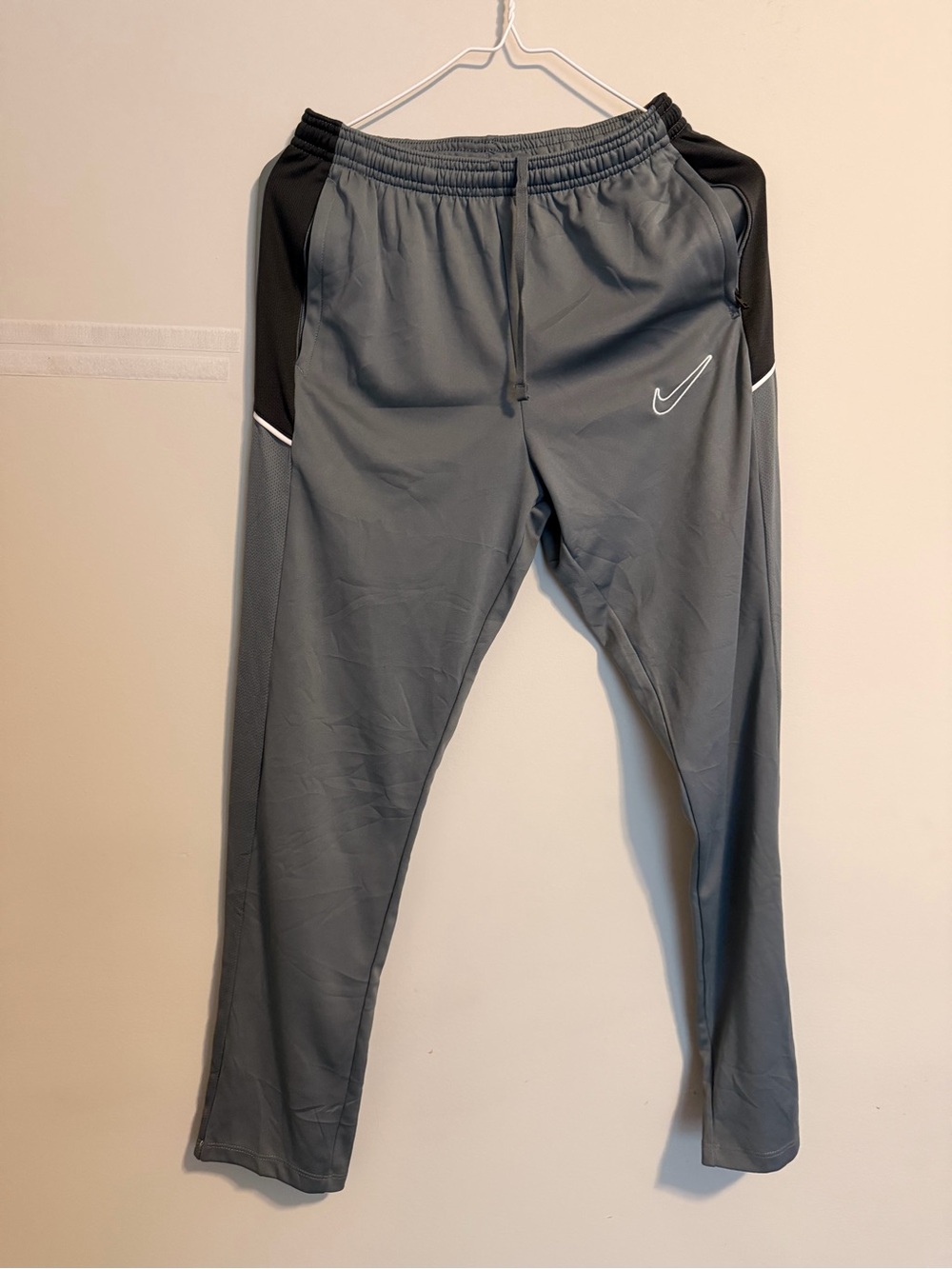 Nike Gray Track Pants with Black Accents and White Swoosh